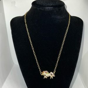 Unicorn with rainbow color stones for the tail and mane.